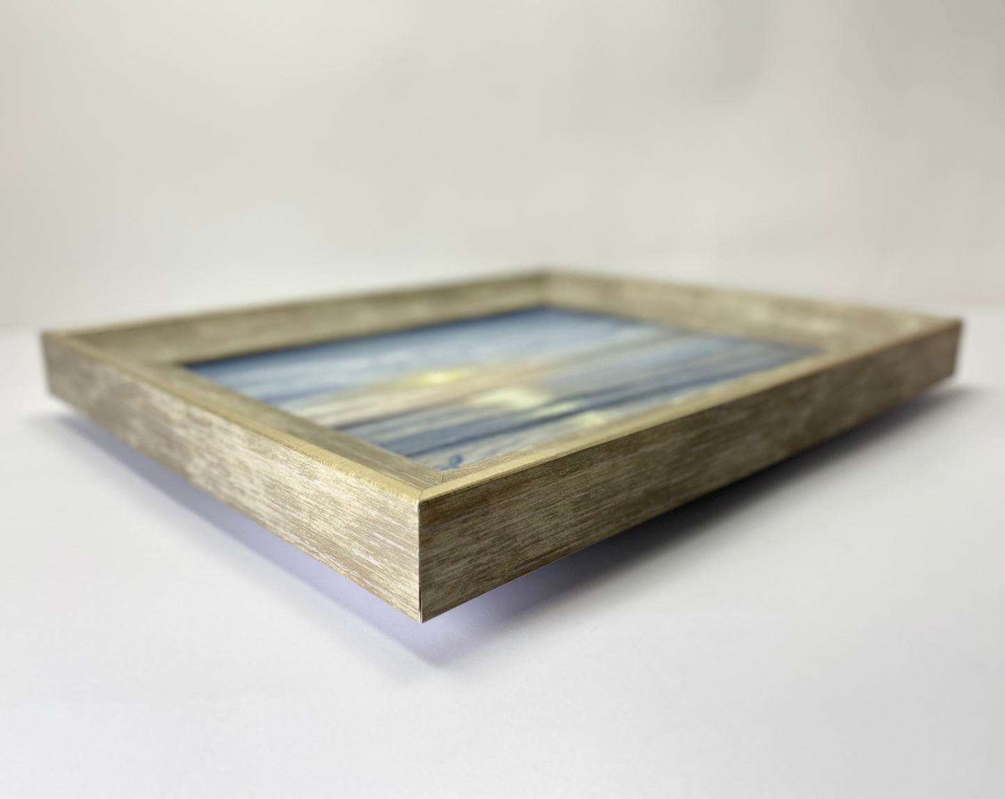 Wooden picture frame on a white background