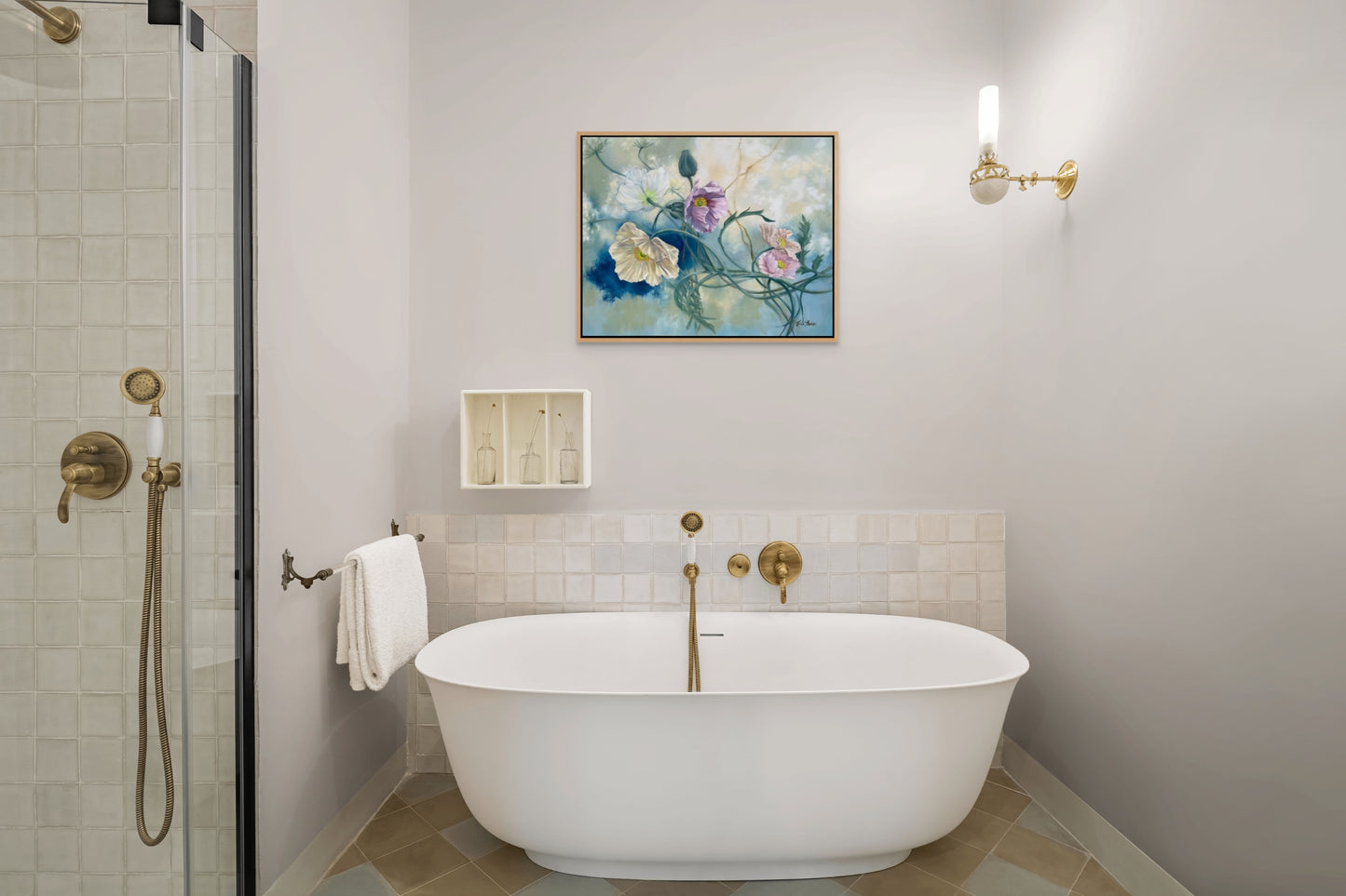 Modern bathroom with freestanding bathtub, shower, and original floral oil painting Tangled Reverie on the wall.