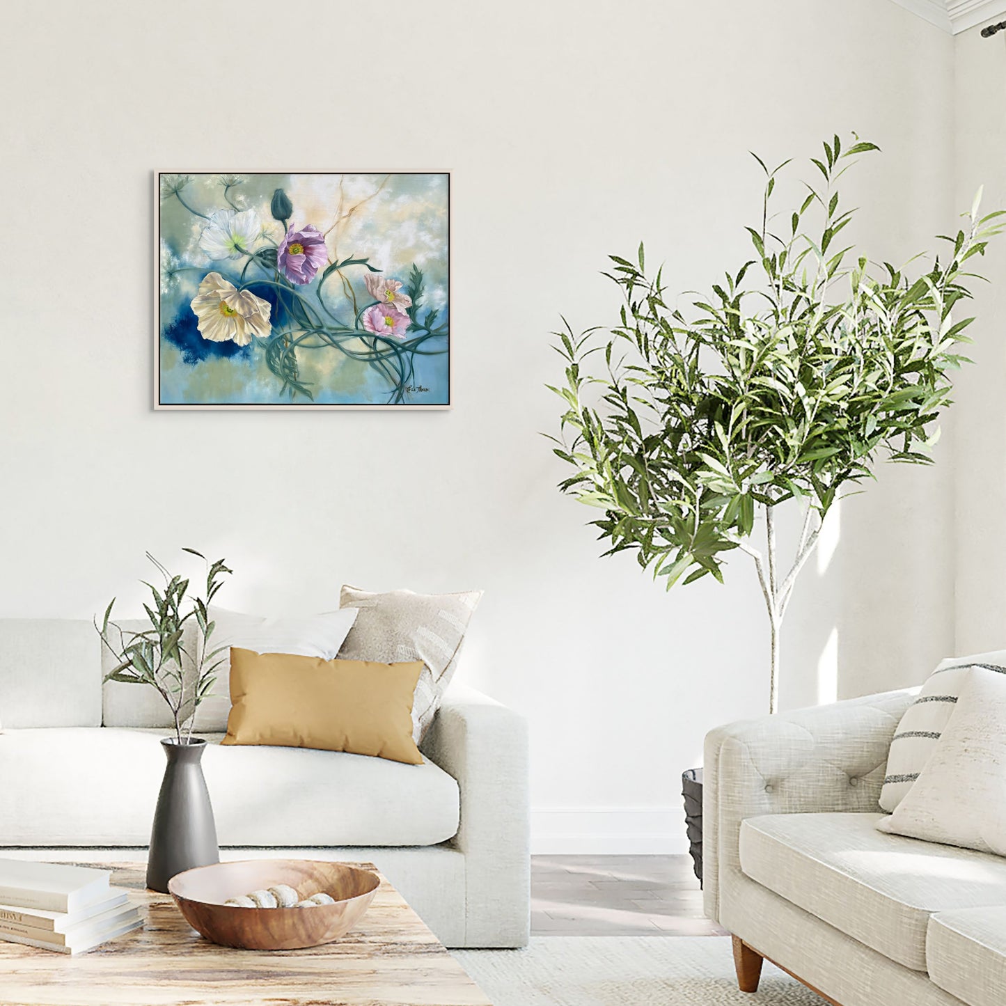 Living room with original floral oil painting Tangled Reverie on the wall, white sofa, and decorative plants.