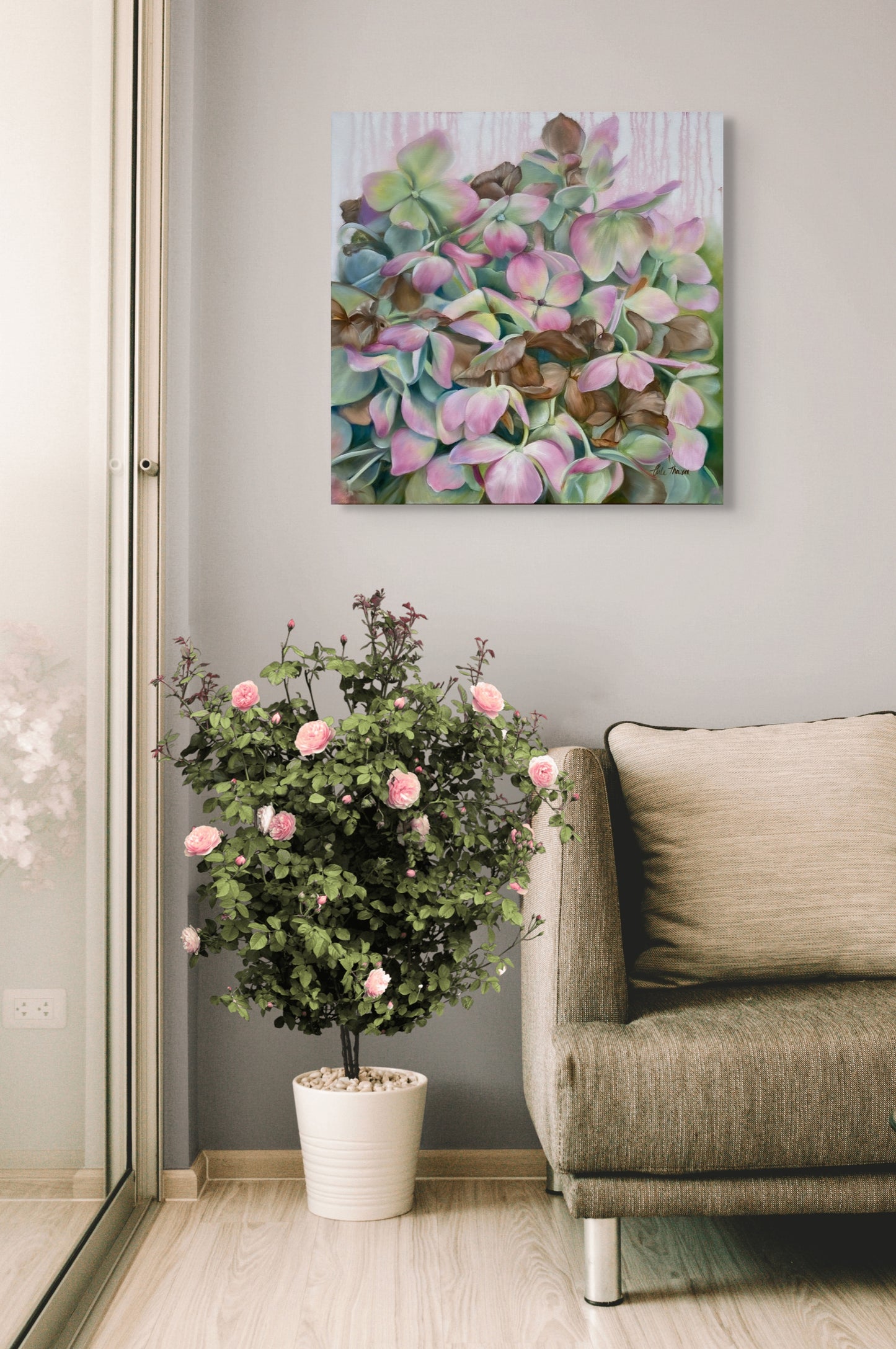 Whispers of Time original oil painting shown on a neutral wall over a sofa and flowering plant