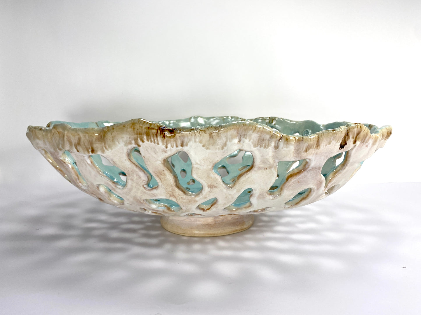 Openwork: Coastal — Tidepool, side profile on white background showing depth and irregular shoreline rim