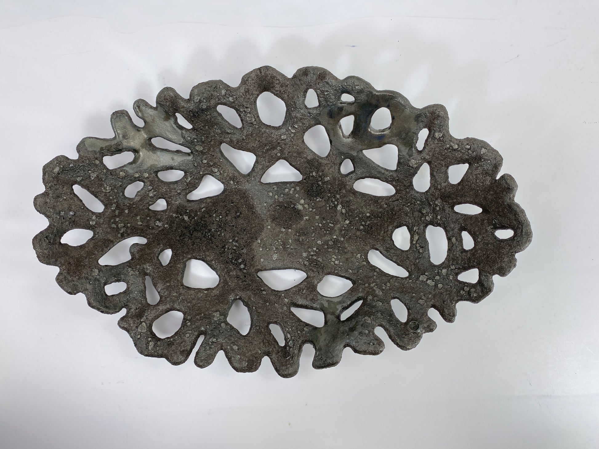 Openwork: Coastal — Nighttide, overhead view showing full openwork pattern and dark coastal glaze