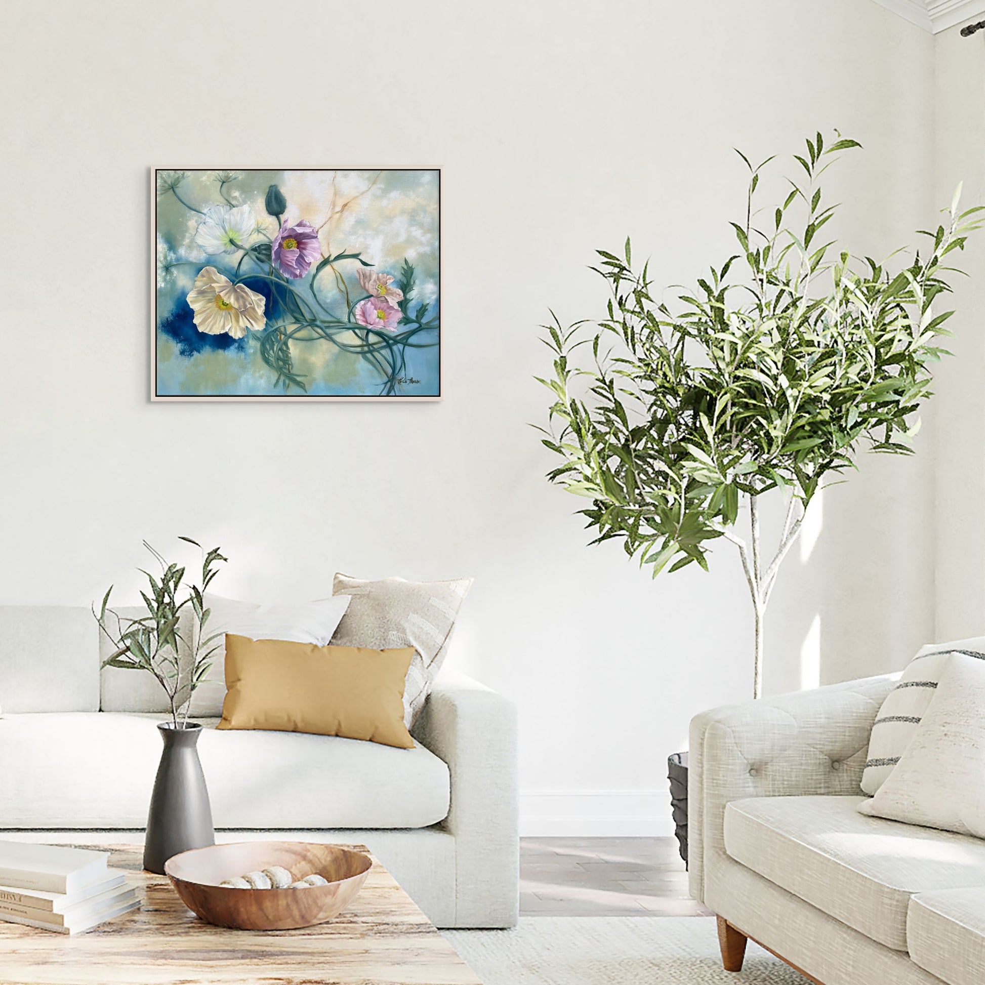 Living room with original floral oil painting Tangled Reverie on the wall, white sofa, and decorative plants.